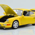 Porsche 911 964 Carrera 2 Amarillo Norev 1:18 - image 2 of 8