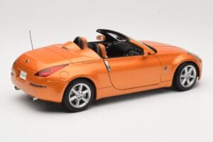 Nissan Fairlady Z Z33 Roadster Sunset Orange AUTOart 1:18 77377 Metal - imagen 3 de 8