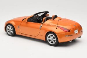 Nissan Fairlady Z Z33 Roadster Sunset Orange AUTOart 1:18 77377 Metal - imagen 7 de 8