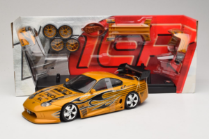 Toyota Supra A80 Dorado Tunerz Edition Hot Wheels 1:18 B6091 Metal - imagen 2 de 7