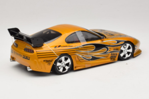 Toyota Supra A80 Dorado Tunerz Edition Hot Wheels 1:18 B6091 Metal - imagen 3 de 7